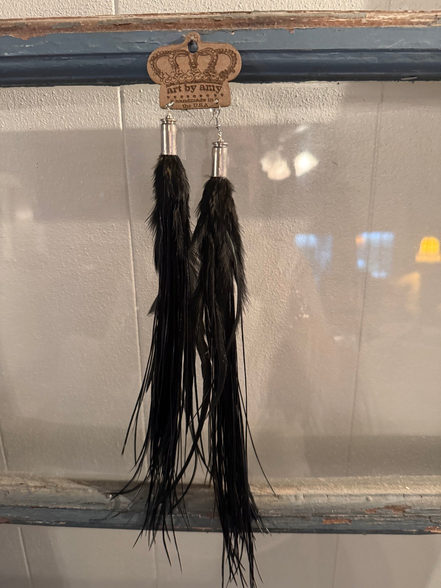 Black guinea feather earrings