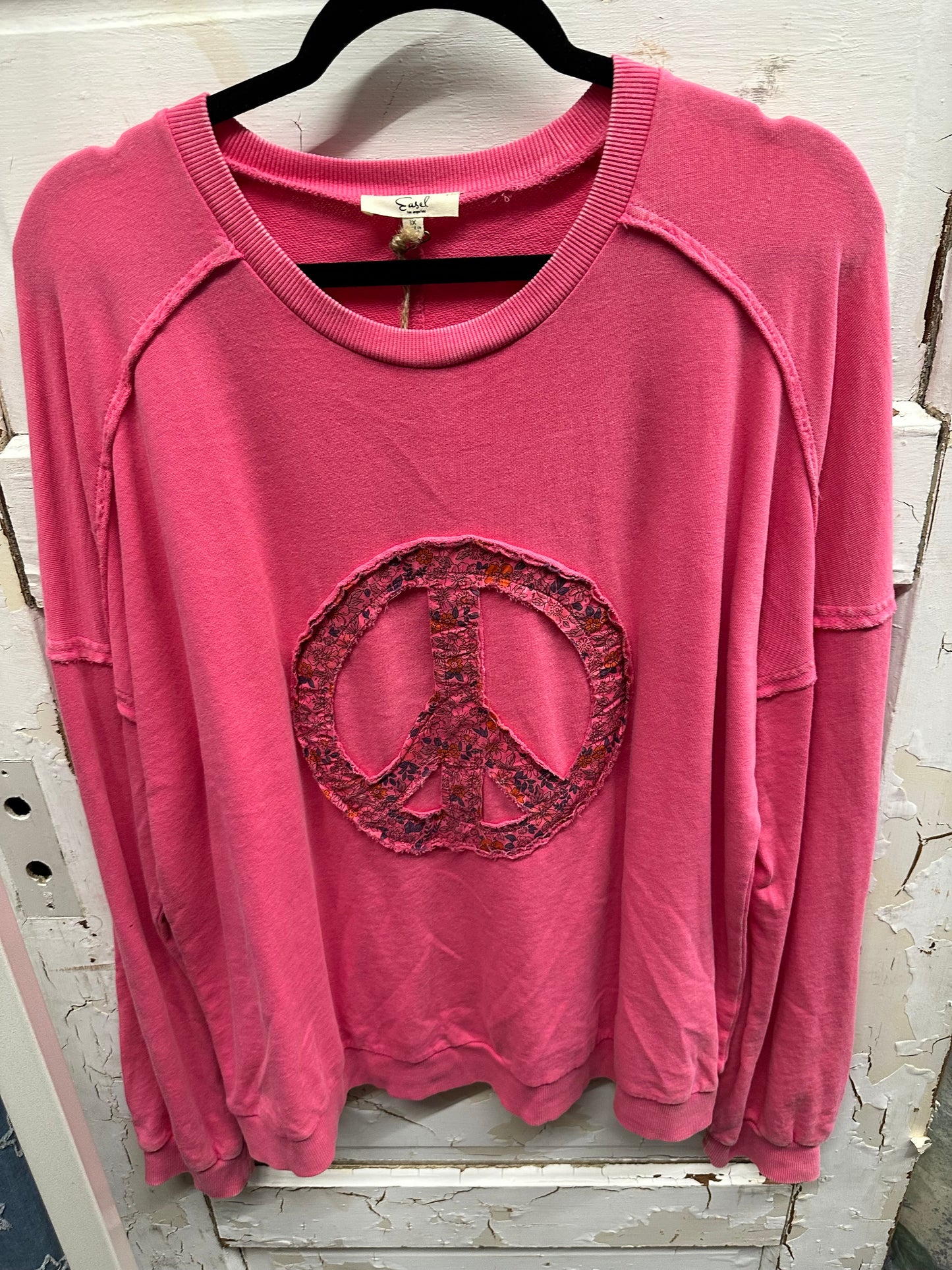 Pink easel peace sweatshirt