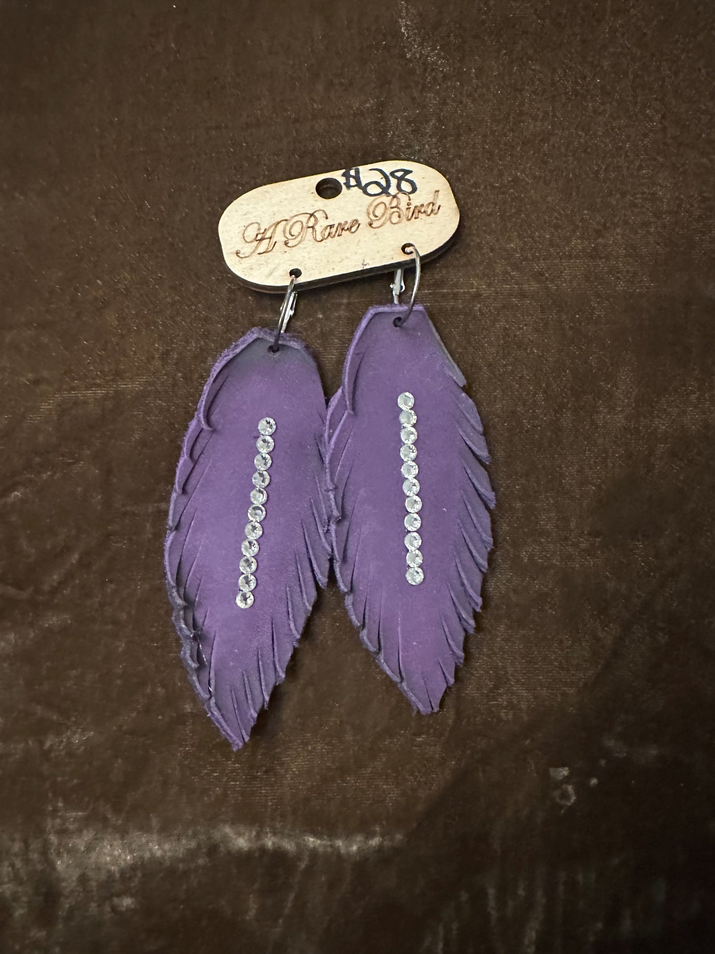 A Rare bird leather earrings